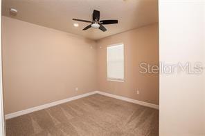 7845 Wandering Way Orlando, FL 32836 - Photo 22 of 61 an empty room