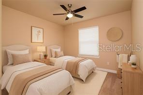 7845 Wandering Way Orlando, FL 32836 - Photo 27 of 61 a bedroom with two beds and a chandelier