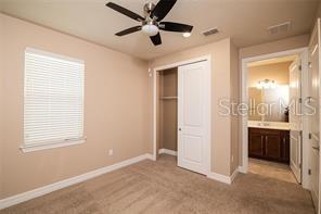 7845 Wandering Way Orlando, FL 32836 - Photo 28 of 61 a view of an empty room with a bathroom