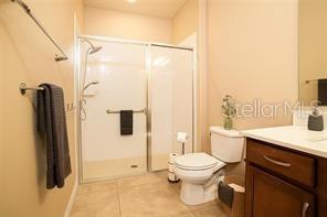 7845 Wandering Way Orlando, FL 32836 - Photo 33 of 61 a bathroom with a toilet sink and shower