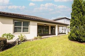 7845 Wandering Way Orlando, FL 32836 - Photo 46 of 61 a front view of a house with a yard