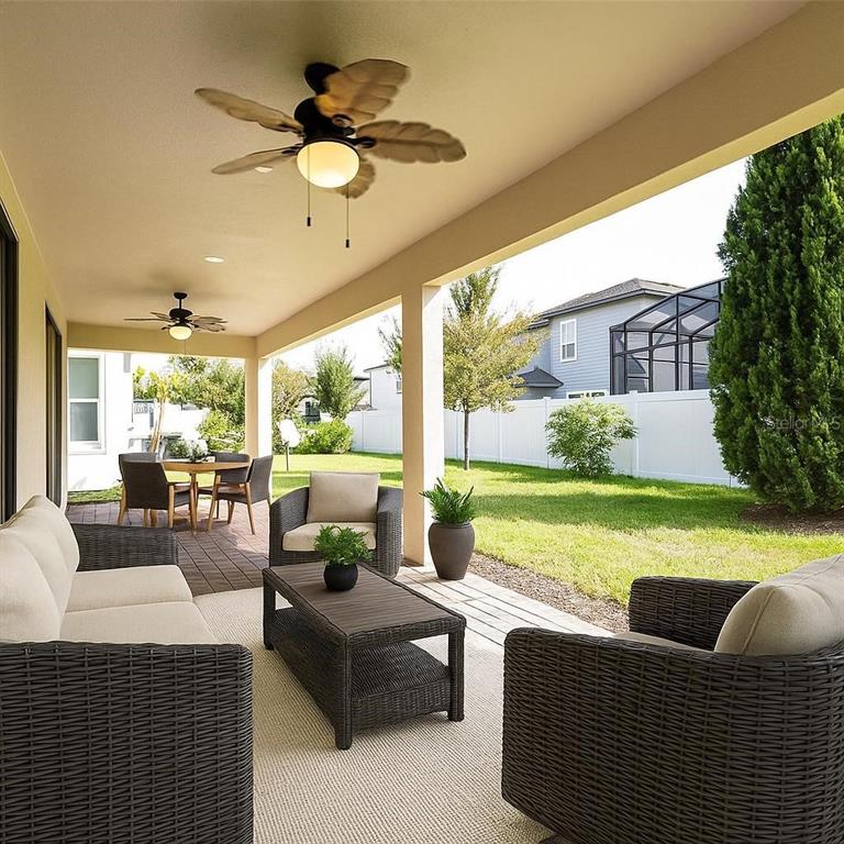 7845 Wandering Way Orlando, FL 32836 - Photo 54 of 61 a living room with furniture and a large window