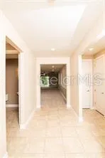 a kitchen with stainless steel appliances a sink stove and refrigerator