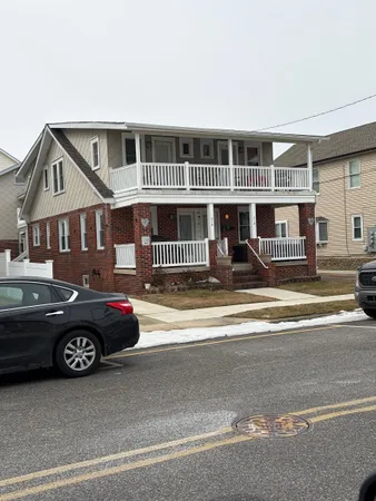 a car parked in front of a house