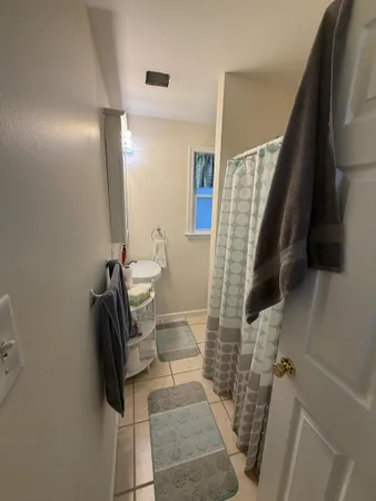 a bathroom with a sink and mirror
