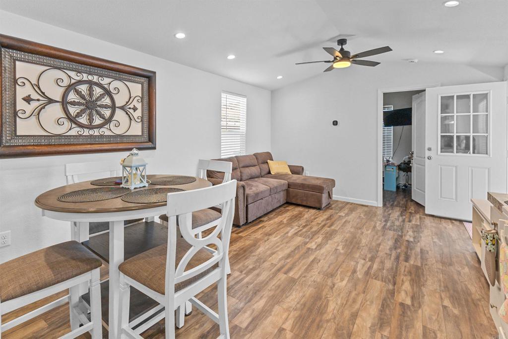 3221 Bancroft Drive, Unit 25 Spring Valley, CA 91977 - Photo 6 of 17 a living room with furniture and wooden floor