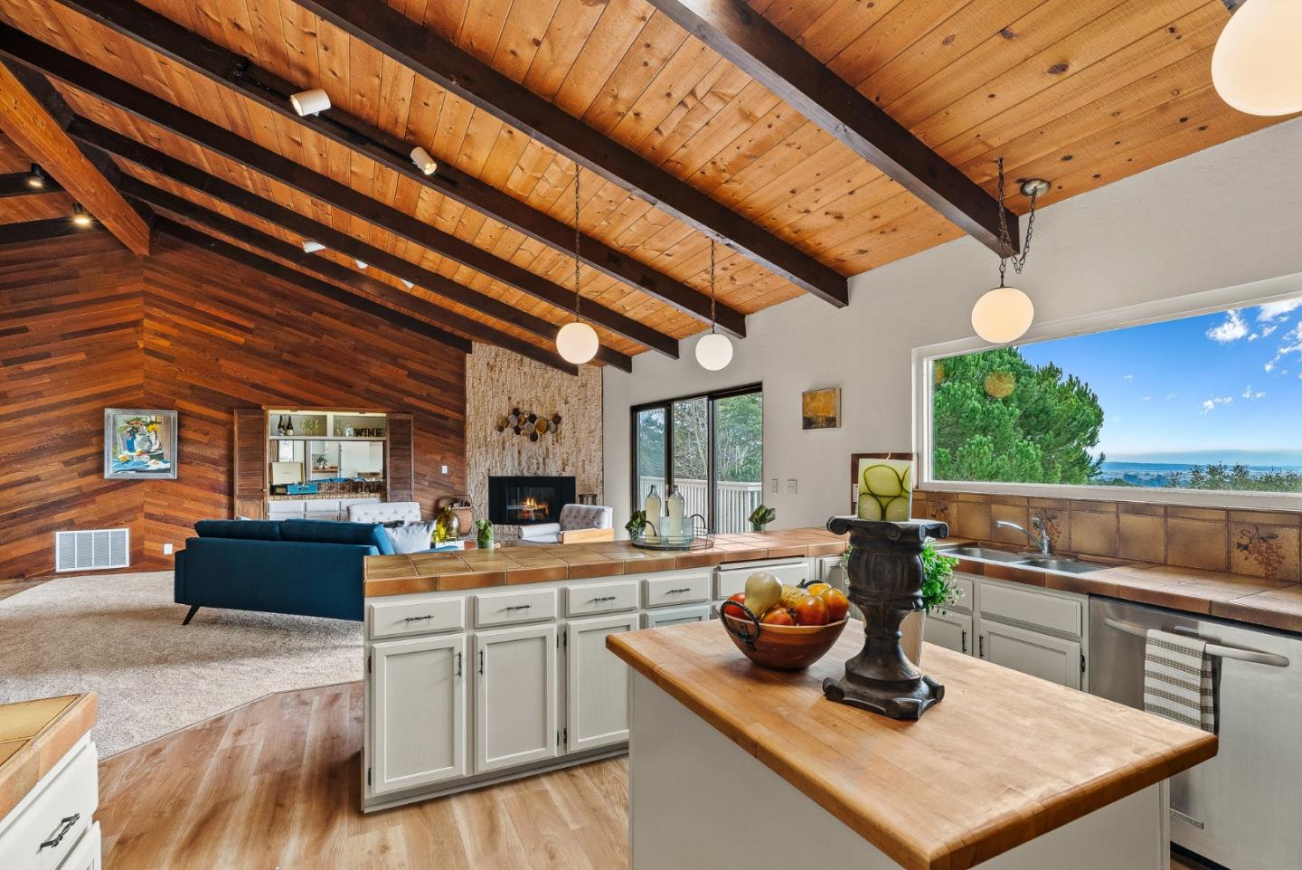 330 Enos Lane Corralitos, CA 95076 - Photo 13 of 73 a kitchen with a stove a counter space a sink and cabinets