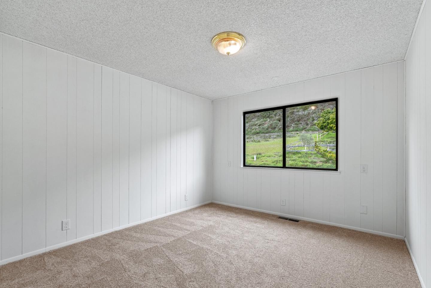 330 Enos Lane Corralitos, CA 95076 - Photo 30 of 73 an empty room with windows