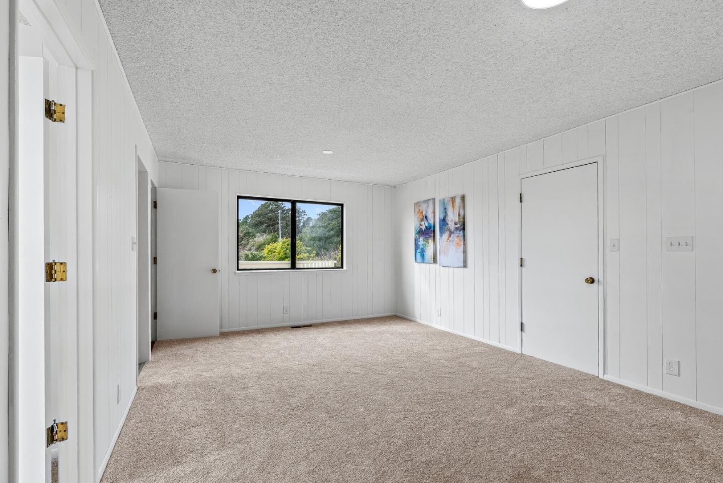 330 Enos Lane Corralitos, CA 95076 - Photo 32 of 73 a view of an empty room with a window