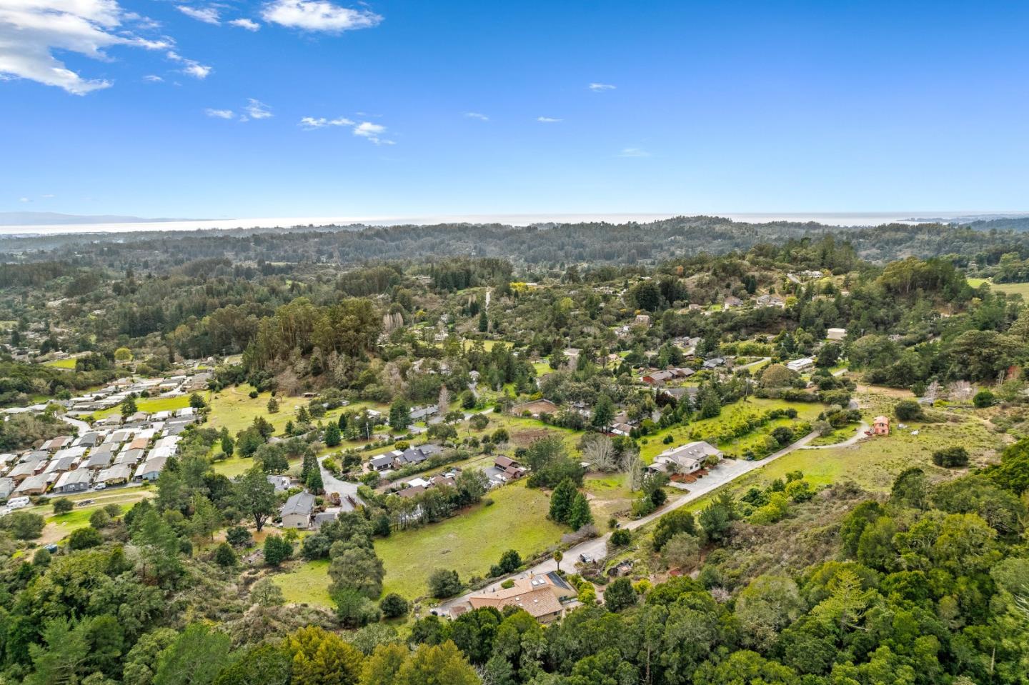 330 Enos Lane Corralitos, CA 95076 - Photo 49 of 73 a view of a city with lush green forest