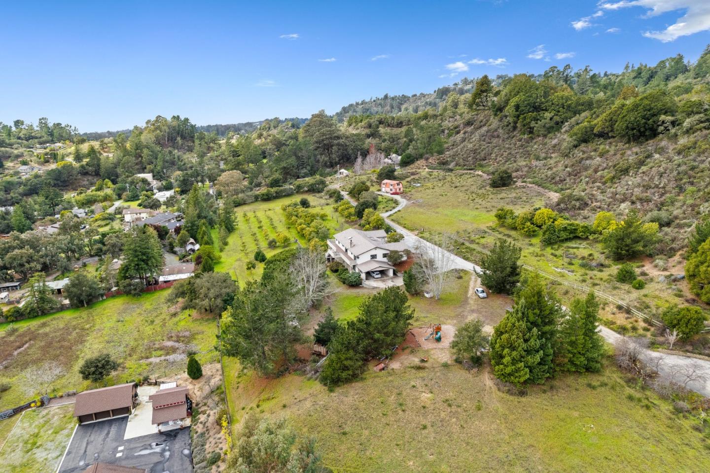 330 Enos Lane Corralitos, CA 95076 - Photo 60 of 73 an aerial view of residential houses with outdoor space and trees