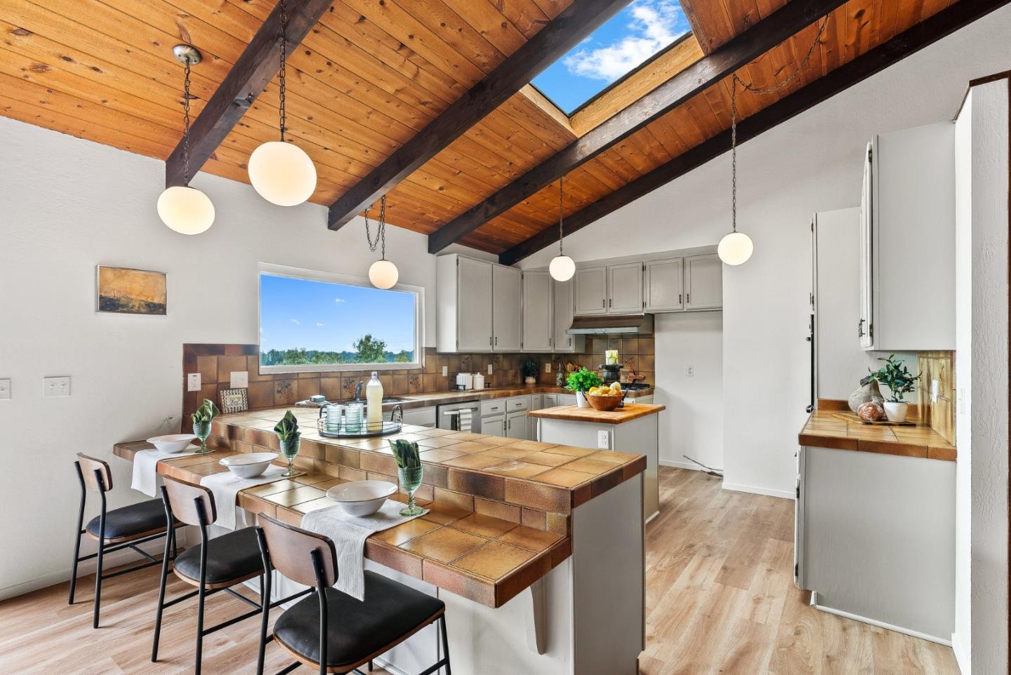 330 Enos Lane Corralitos, CA 95076 - Photo 10 of 73 a view of a dining room with furniture and a kitchen