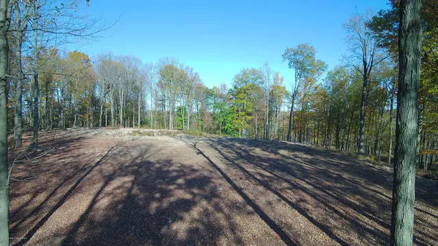a view of a yard with mountain view