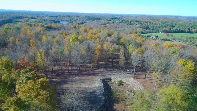 a view of a yard with an outdoor space
