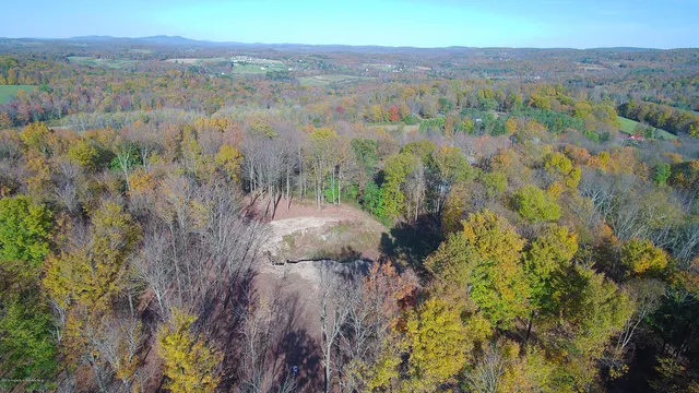 a view of a lake with mountains in the background