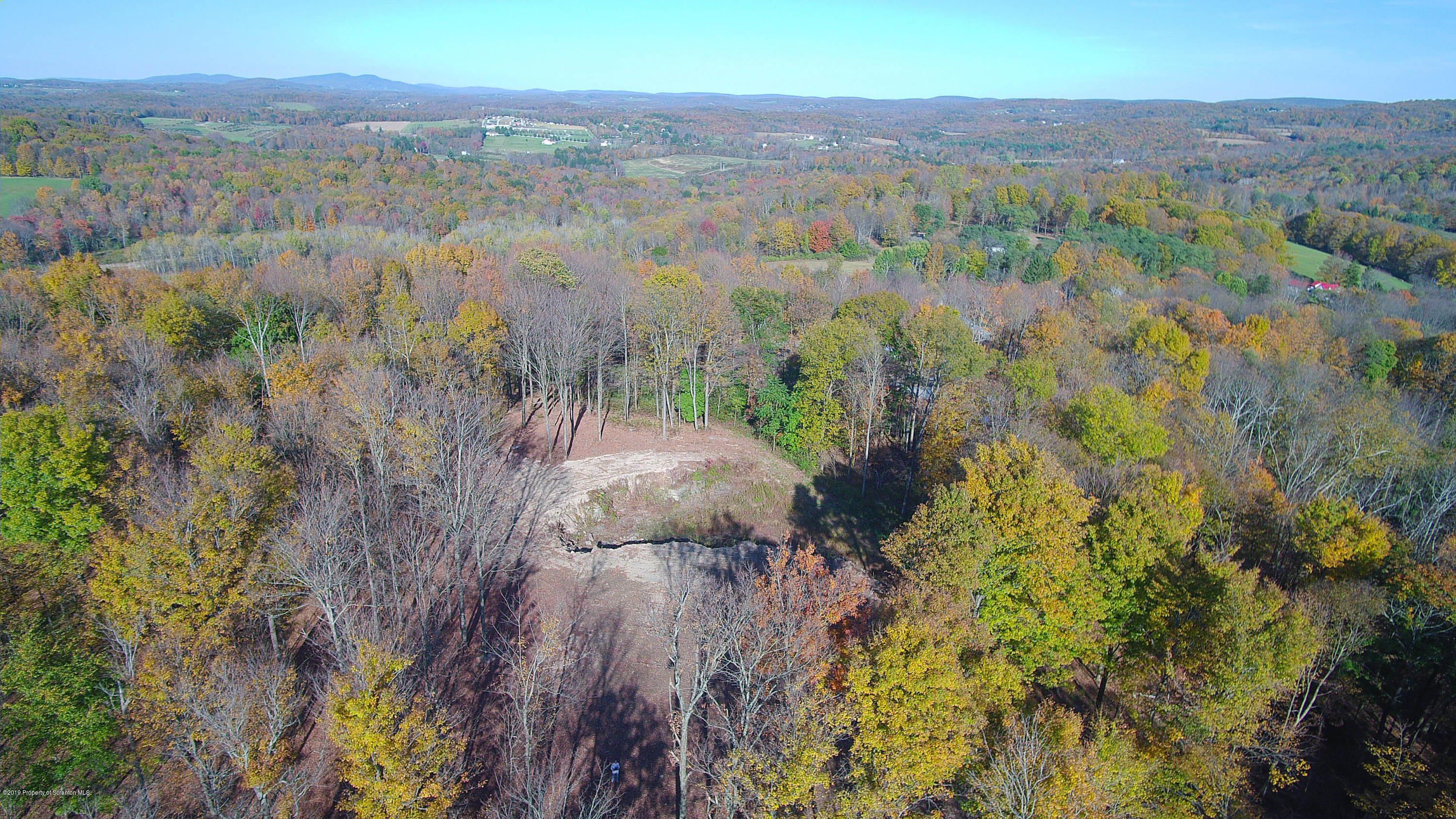 Linair Farms Road Dalton, PA 18414 - Photo 9 of 34 a view of a lake with mountains in the background