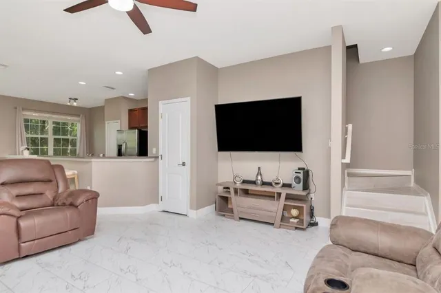 a view of a dining room with furniture window and outside view