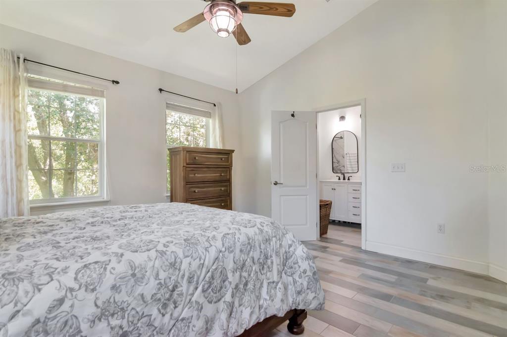 8880 Moonlit Meadows Loop Riverview, FL 33578 - Photo 23 of 43 a bedroom with a bed and a dresser