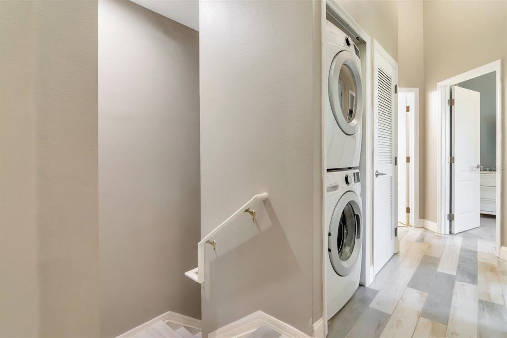 8880 Moonlit Meadows Loop Riverview, FL 33578 - Photo 26 of 43 a utility room with dryer and washer