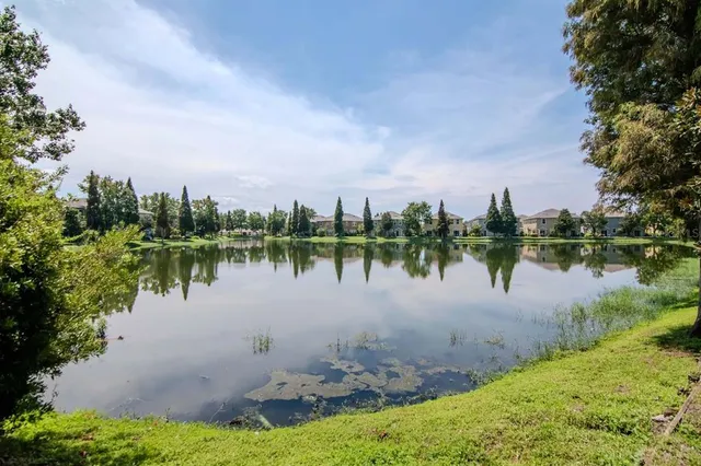 a view of swimming pool with a patio