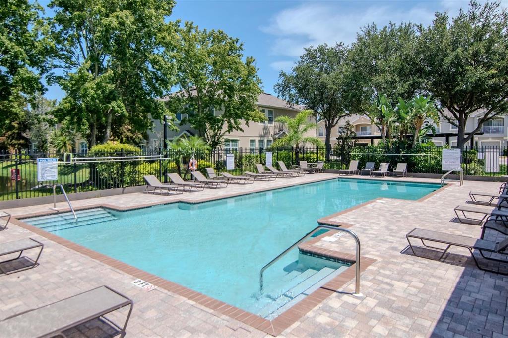 8880 Moonlit Meadows Loop Riverview, FL 33578 - Photo 43 of 43 an outdoor view of a garden with swimming pool