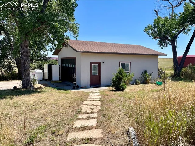 a house view with a outdoor space