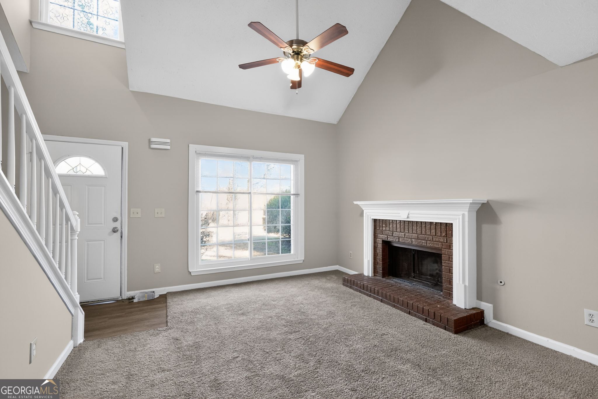 3751 Oakwood Manor Court Decatur, GA 30032 - Photo 16 of 33 a view of an empty room with window and fireplace