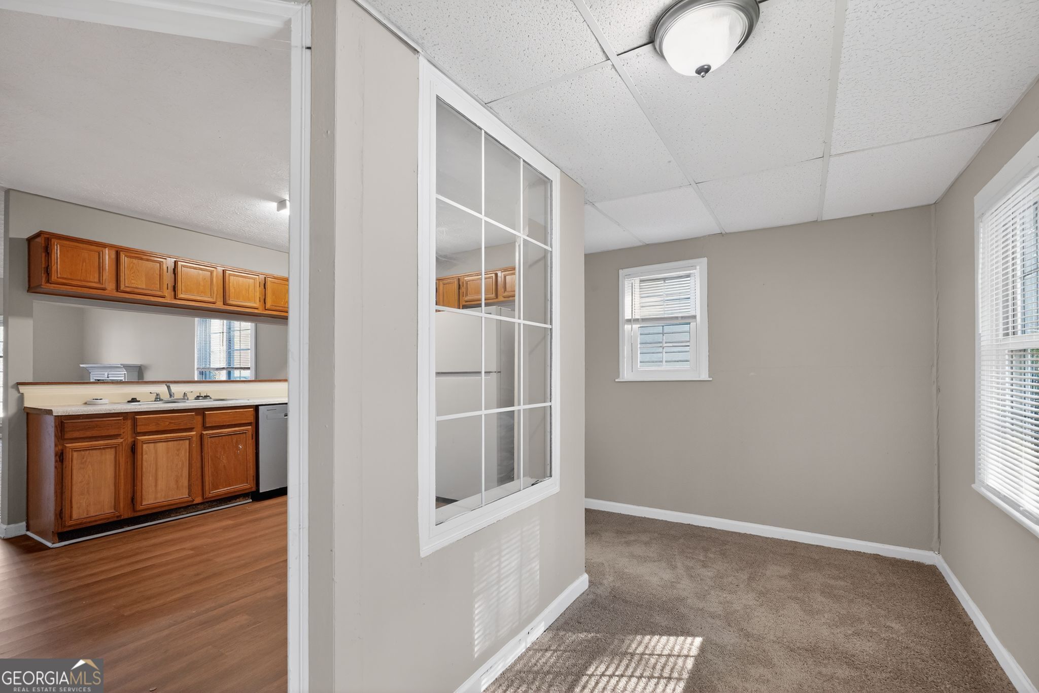 3751 Oakwood Manor Court Decatur, GA 30032 - Photo 21 of 33 a room with stainless steel appliances granite countertop a stove and a refrigerator