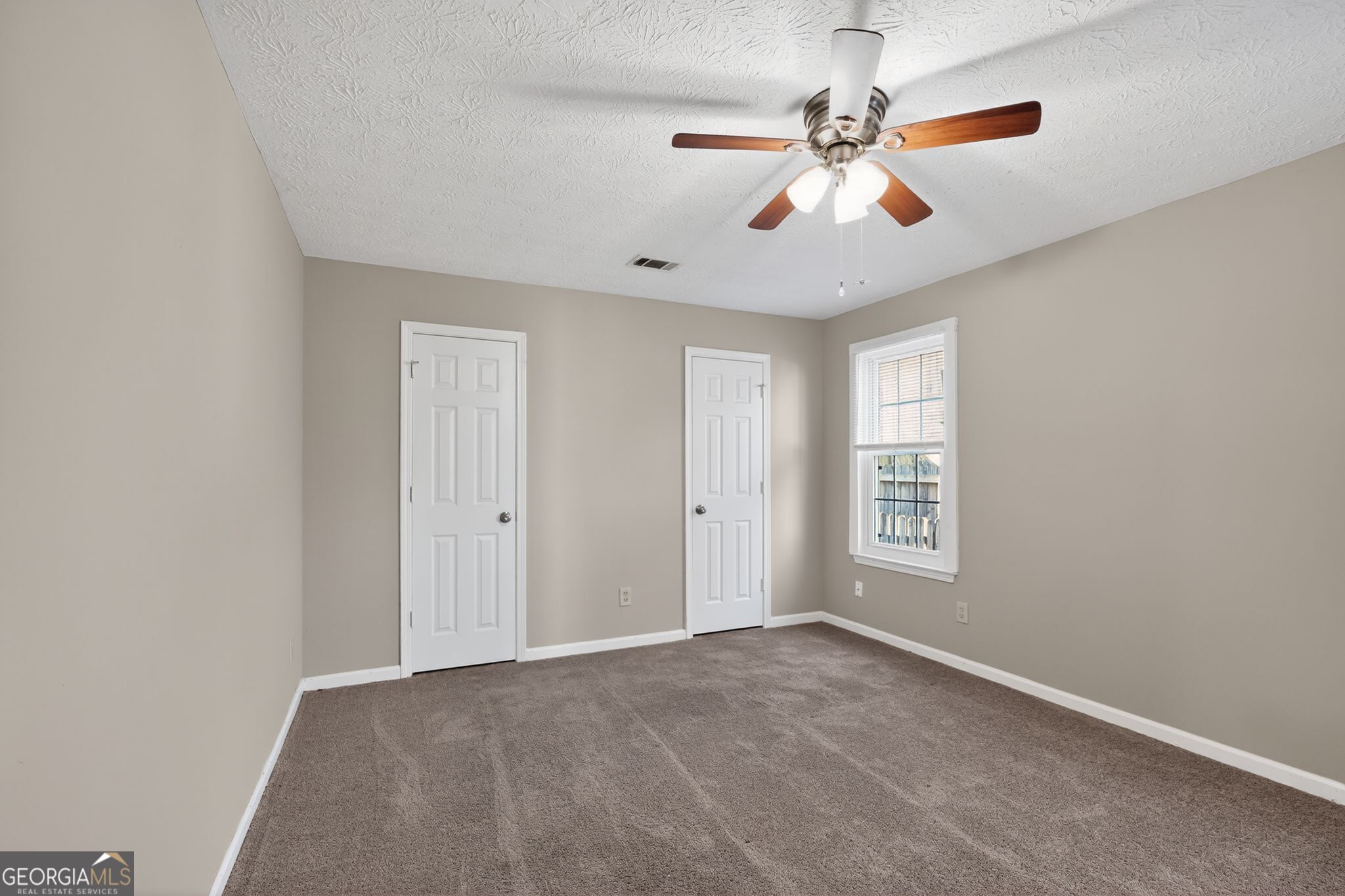 3751 Oakwood Manor Court Decatur, GA 30032 - Photo 26 of 33 a view of an empty room with a window