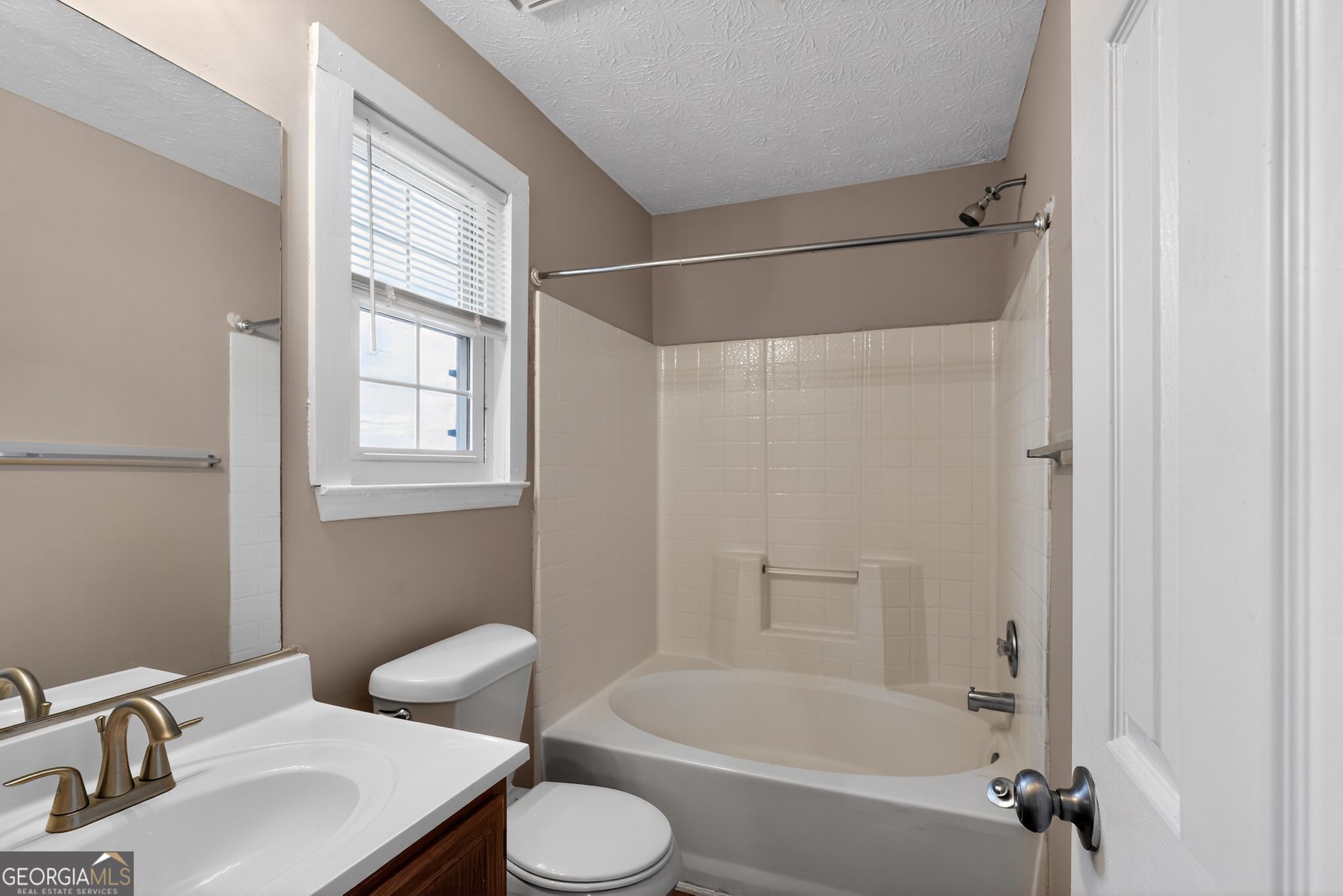 3751 Oakwood Manor Court Decatur, GA 30032 - Photo 31 of 33 a bathroom with a sink toilet and shower