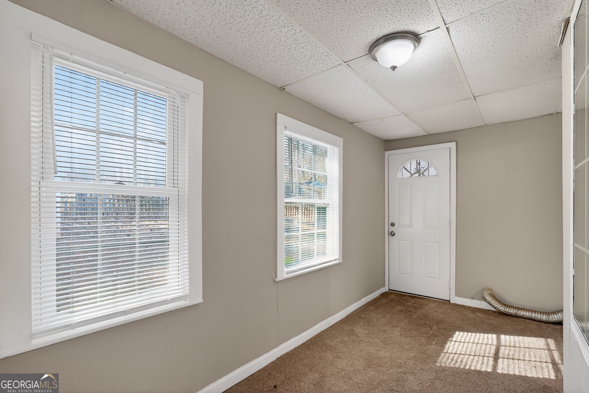 3751 Oakwood Manor Court Decatur, GA 30032 - Photo 6 of 33 a view of an empty room with a window