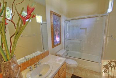 21 Bellisimo Court Rancho Mirage, CA 92270 - Photo 20 of 25 a bathroom with a sink toilet and shower
