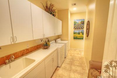 21 Bellisimo Court Rancho Mirage, CA 92270 - Photo 23 of 25 a bathroom with a sink and a mirror