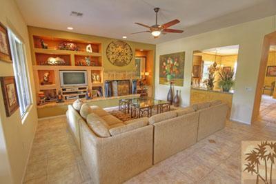 21 Bellisimo Court Rancho Mirage, CA 92270 - Photo 7 of 25 a living room with furniture and a large window