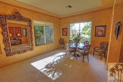 21 Bellisimo Court Rancho Mirage, CA 92270 - Photo 9 of 25 a living room with furniture and a large window
