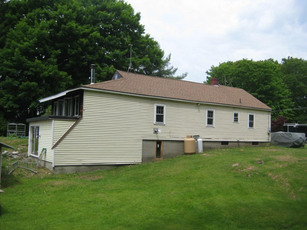 422 Killingly Road Pomfret, CT 06259 - Photo 1 of 1 a aerial view of a house next to a yard and deck