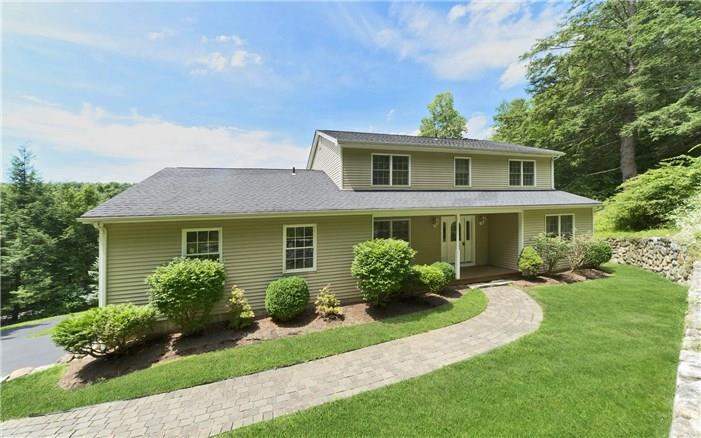 16 Old Lantern Road New Milford, CT 06776 - Photo 1 of 1 a front view of a house with a yard