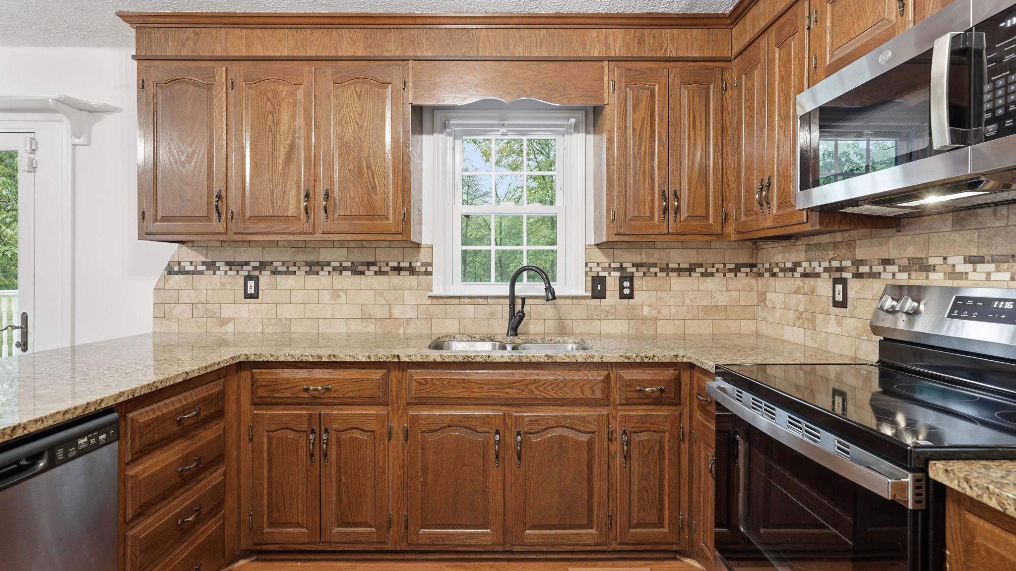 10550 Brent Town Road Catlett, VA 20119 - Photo 23 of 52 Granite Countertops & Tile Backsplash.
