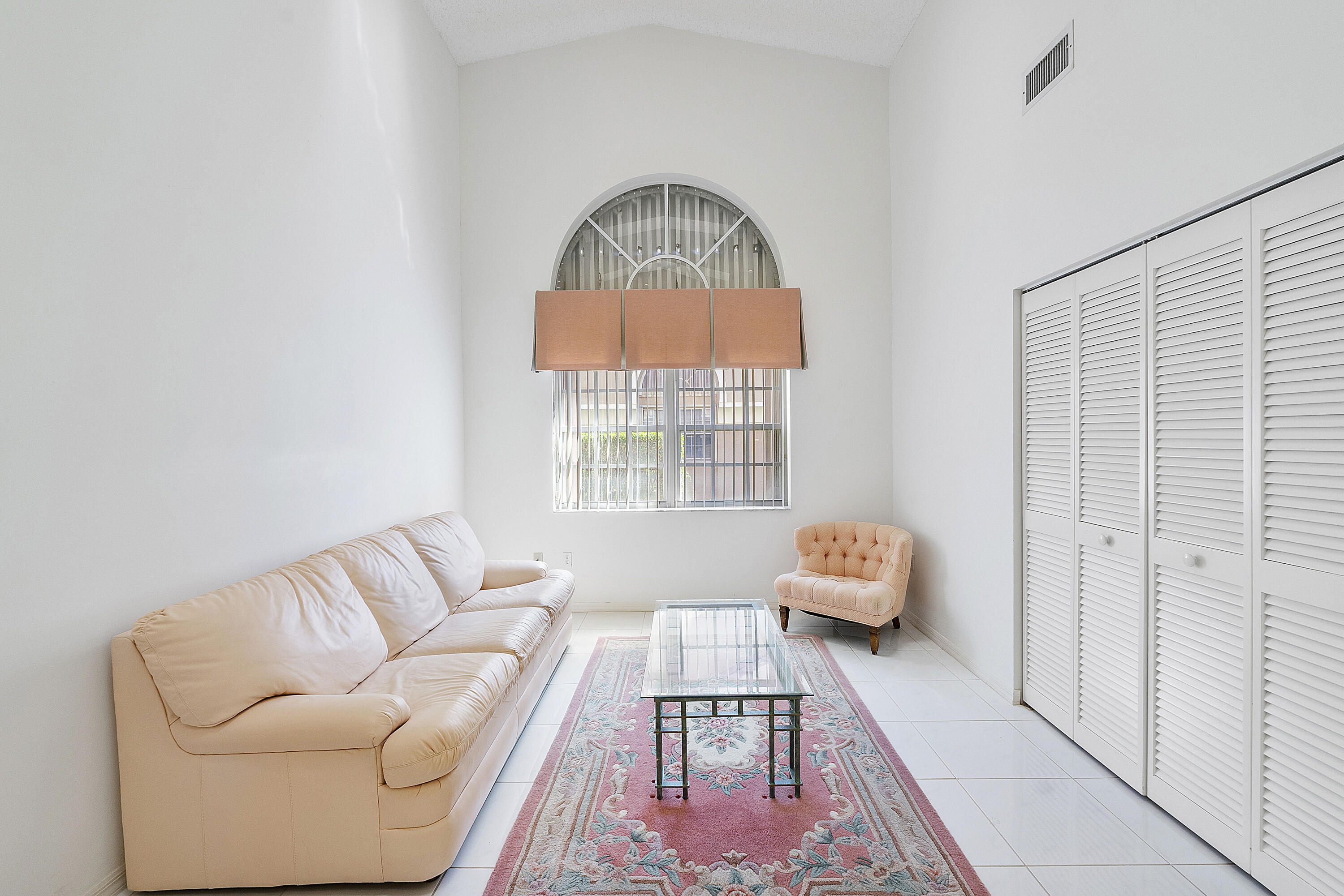 9705 Malvern Drive Tamarac, FL 33321 - Photo 13 of 29 a bedroom with furniture and a window