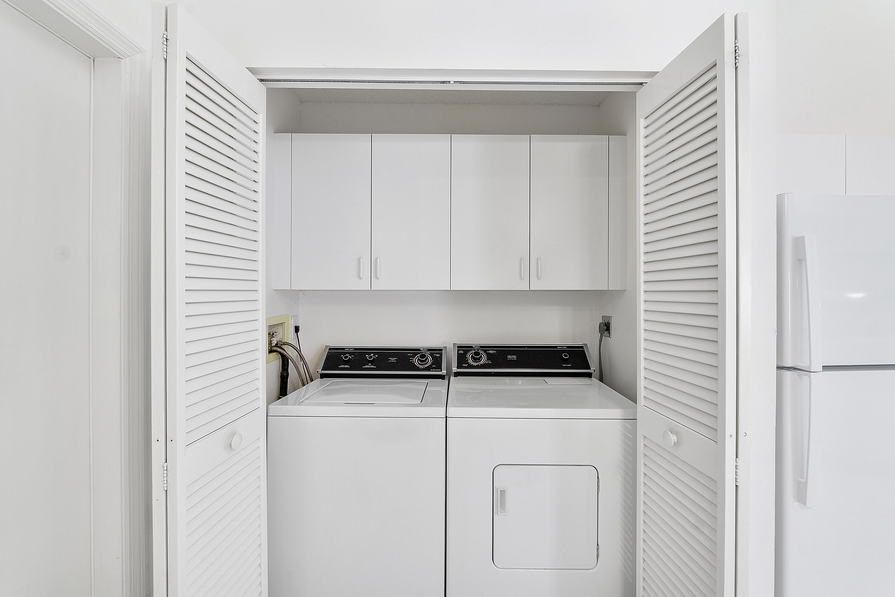 9705 Malvern Drive Tamarac, FL 33321 - Photo 19 of 29 a utility room with dryer and washer