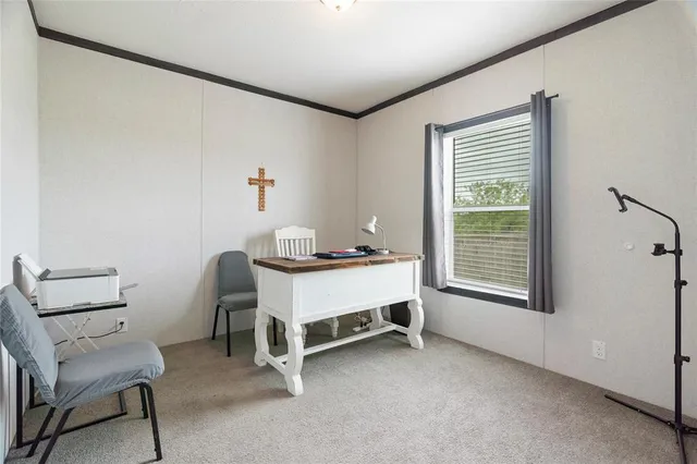 a room with furniture and a window