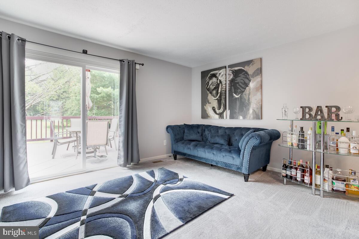 38 Powder View Court Baltimore, MD 21236 - Photo 15 of 47 Living room, sliders to rear deck