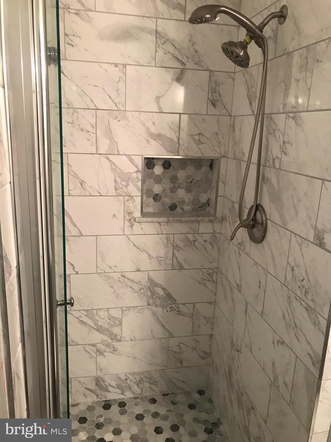 38 Powder View Court Baltimore, MD 21236 - Photo 22 of 47 Primary bathroom shower with niche