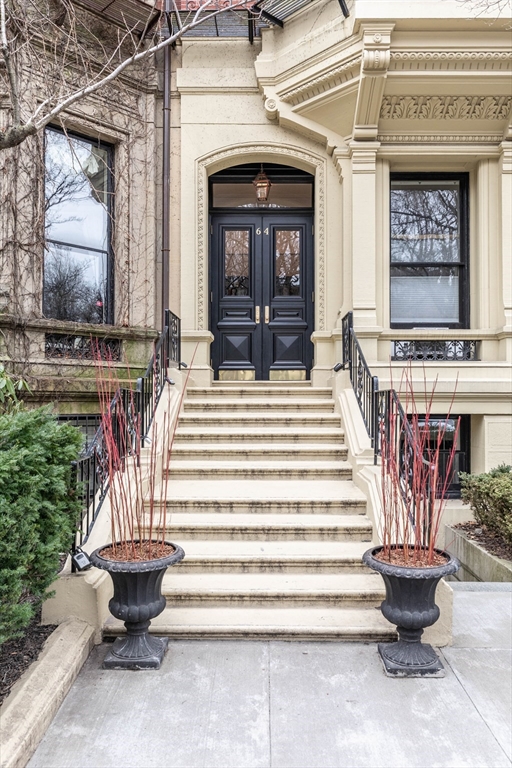 64 Commonwealth Avenue, Unit G1 Boston, MA 02116 - Photo 12 of 12 a view of a patio with a table and chairs