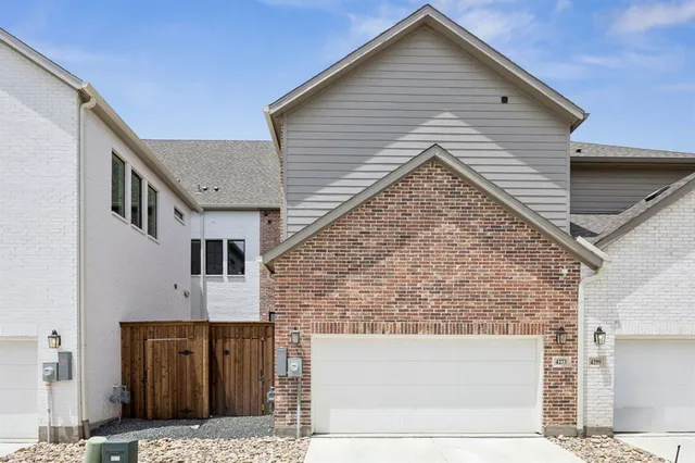 a view of a livingroom with furniture and a window