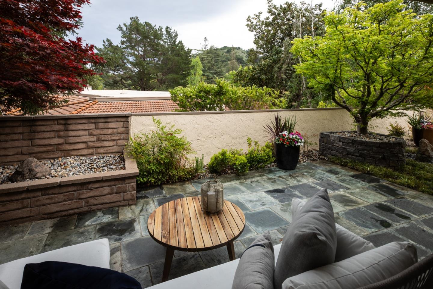 22415 Rancho Deep Cliff Drive Cupertino, CA 95014 - Photo 21 of 33 a backyard of a house with outdoor seating