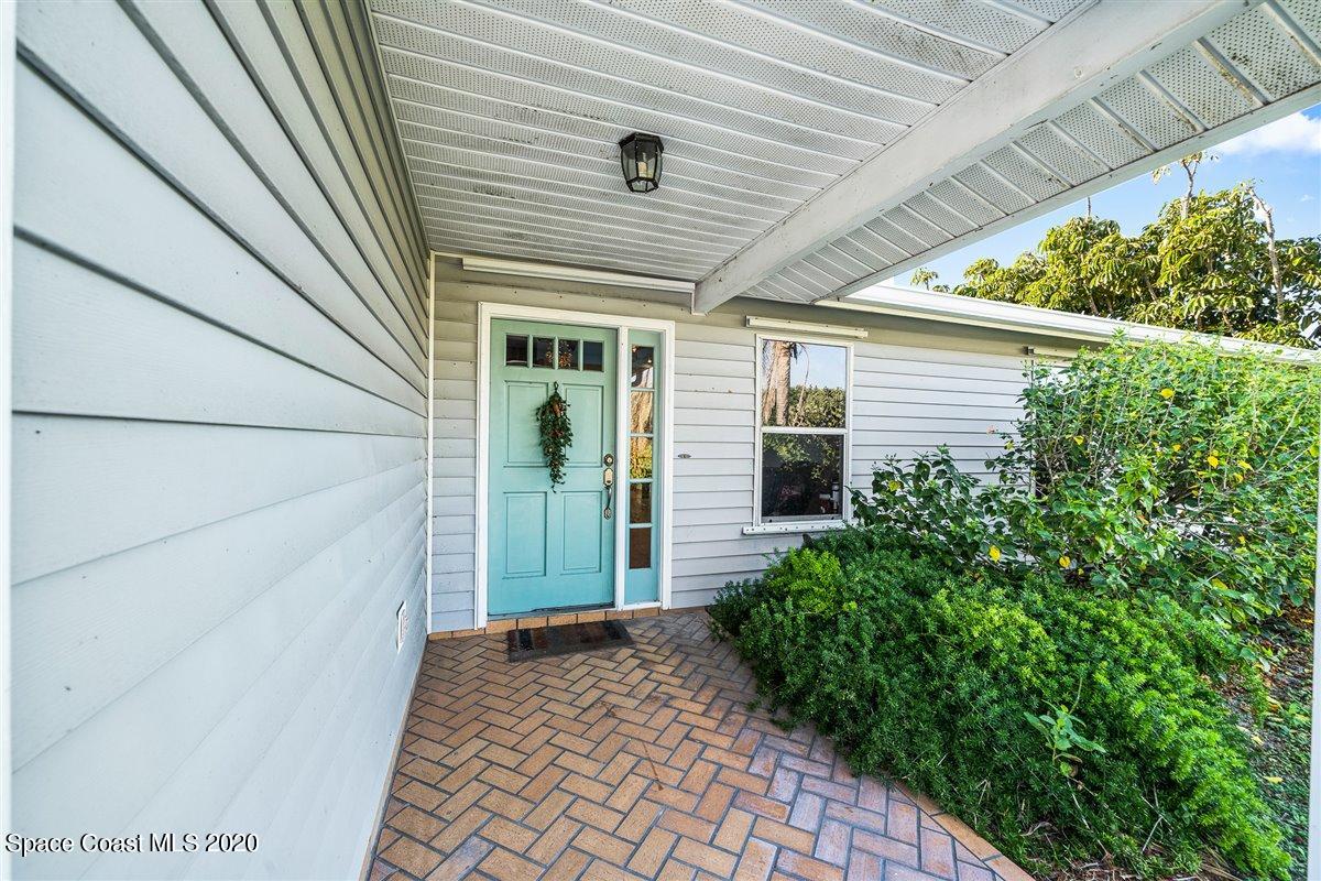 145 Richards Road Melbourne Beach, FL 32951 - Photo 11 of 53 a view of a back yard of the house