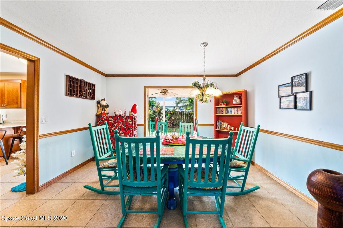 145 Richards Road Melbourne Beach, FL 32951 - Photo 16 of 53 a view of a dining room with furniture window and outside view