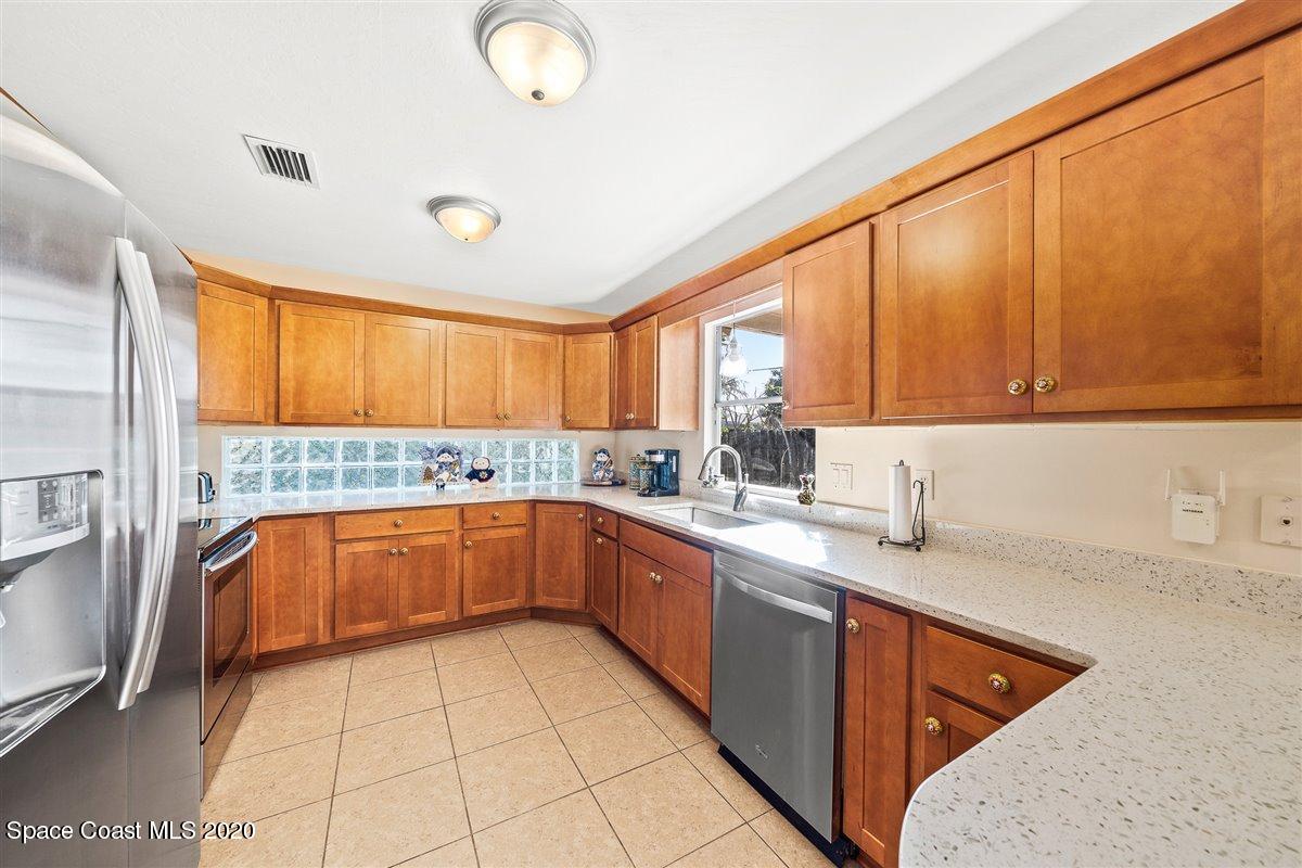 145 Richards Road Melbourne Beach, FL 32951 - Photo 23 of 53 a large kitchen with a large window