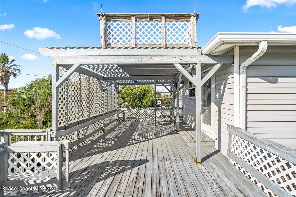 145 Richards Road Melbourne Beach, FL 32951 - Photo 37 of 53 a view of a balcony with wooden floor